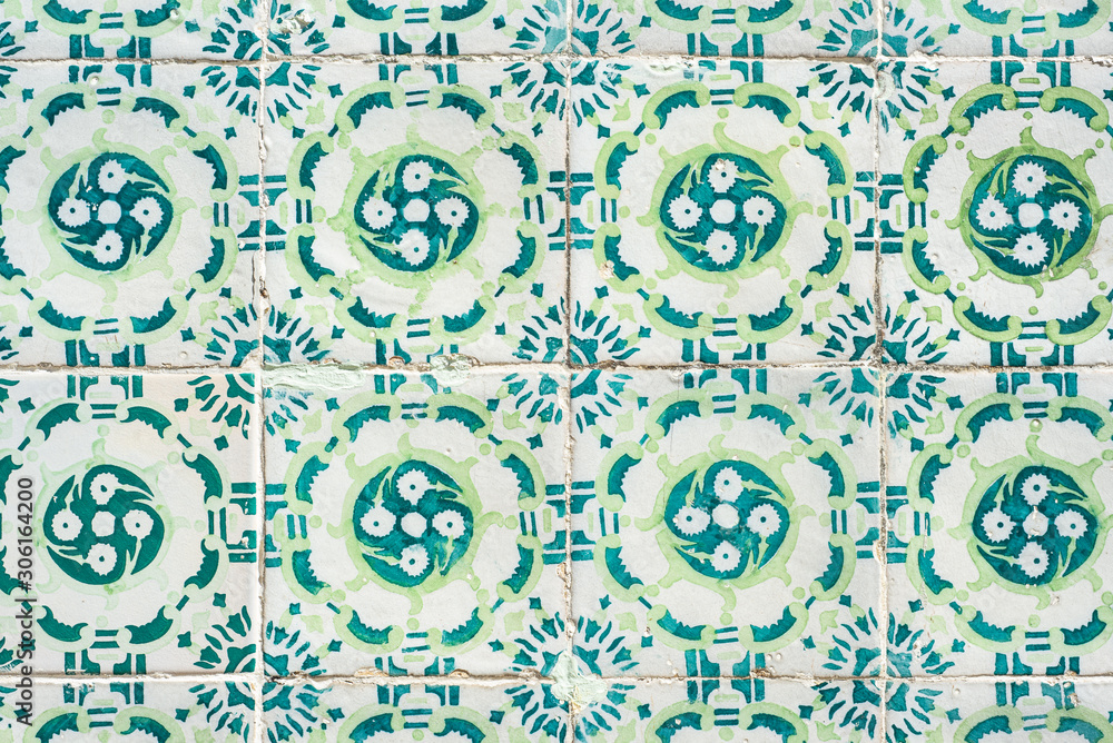 Portuguese wall tiles with blue and green geometric pattern.  