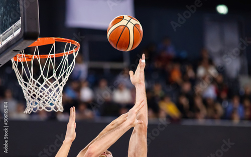 player throwing ball during basketball game © Melinda Nagy