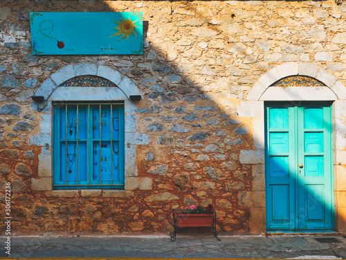 old TRADITIONAL wall with windows and door