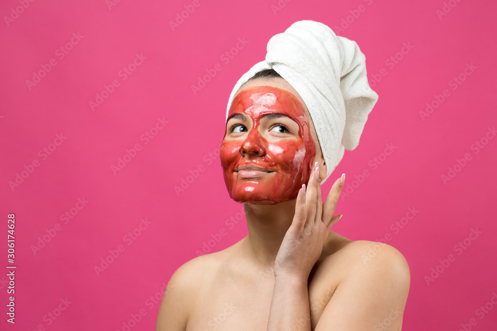 Beauty portrait of woman in white towel on head with gold nourishing mask on face. Skincare cleansing eco organic cosmetic spa relax concept. Beauty portrait of woman in white towel on head with gold nourishing mask on face. Skincare cleansing eco organic cosmetic spa relax concept.