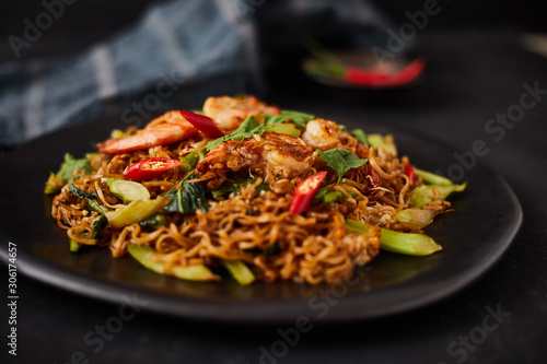 Stir fried noodles with shrimps and vegetables..