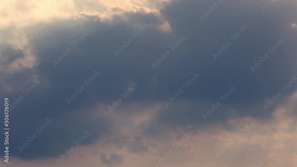 4K timelapse clouds at sunrise. Epic cloudscape shot in fast moving in evening hours. Beautiful sky background. 4K timelapse clouds at sunrise. Epic cloudscape shot in fast moving in evening hours. Beautiful sky background.