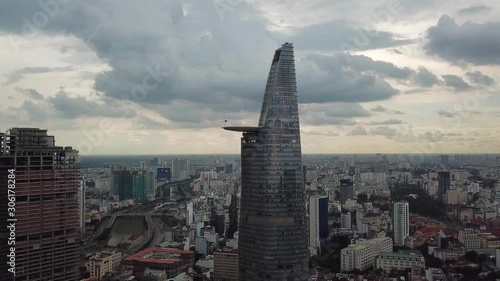 Descending Aerial View of the Bitexco Financial Tower in Ho Chi Minh City Saigon in Vietnam photo