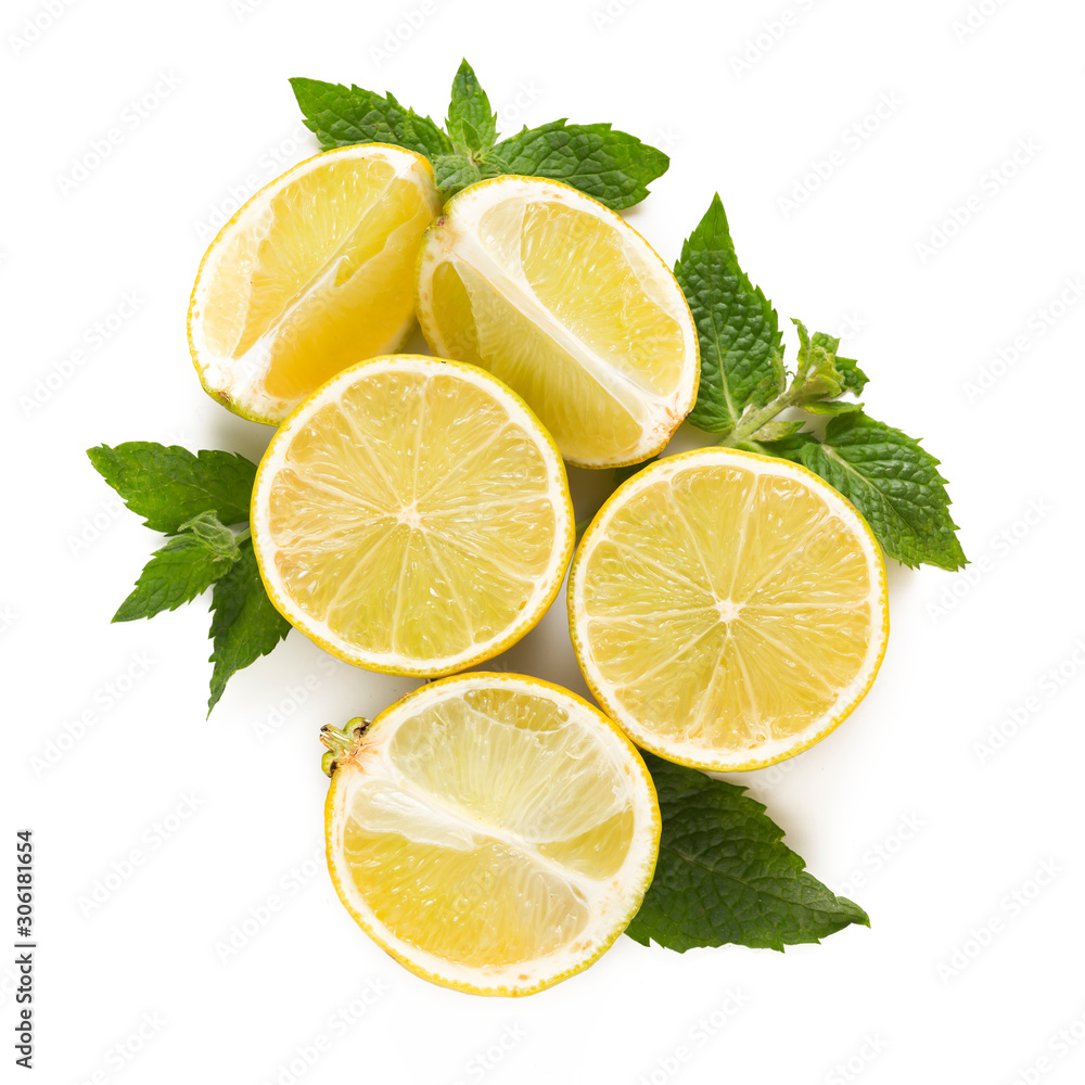 Composition of juicy lemons and mint leaves. Ingredients for cocktails, drinks and tea. Composition of juicy lemons and mint leaves. Ingredients for cocktails, drinks and tea.