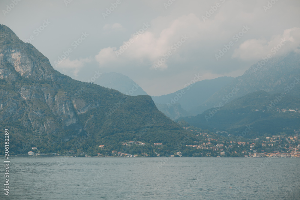 View of Lake Como, Italy. Mountains and water tourism.