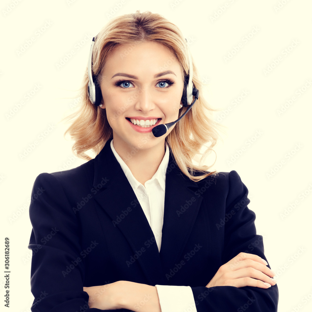 Call center. Smiling young support phone operator in confident style black suit and headset, with crossed hands. Caucasian blond model in customer service help consulting concept. Call center. Smiling young support phone operator in confident style black suit and headset, with crossed hands. Caucasian blond model in customer service help consulting concept.
