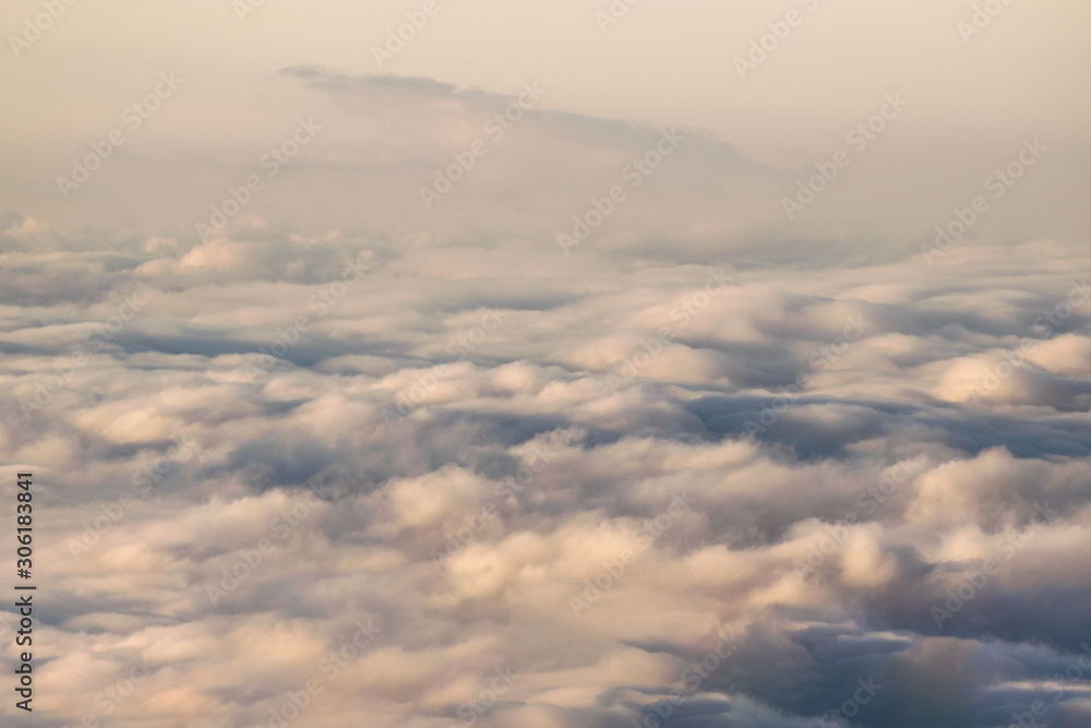 Clouds seen from above on sunrise texture