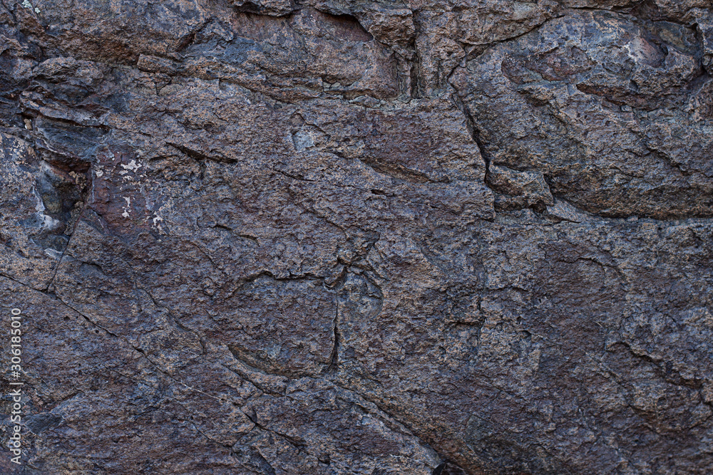 Fototapeta premium The texture of the rock. Monolith. Granite surface