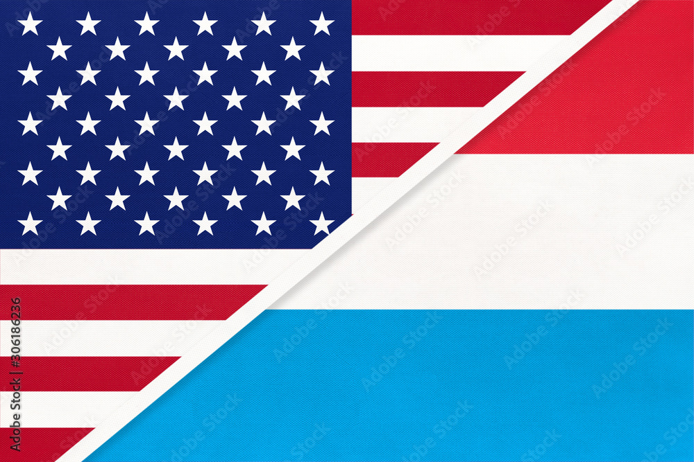 USA vs Luxembourg national flag from textile. Relationship between american and european countries. USA vs Luxembourg national flag from textile. Relationship between american and european countries.