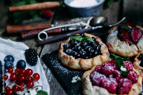 biscuit with berries of blackberry  raspberry  blueberry  black currant  strawberry