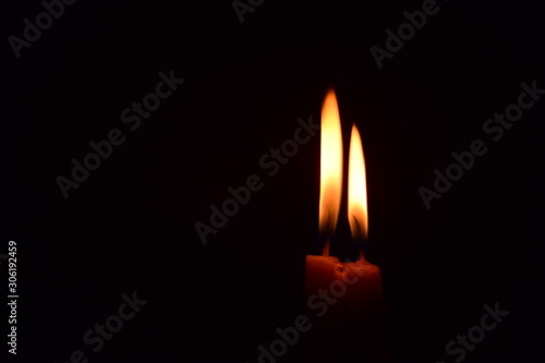 Beautiful fire candle in the dark
