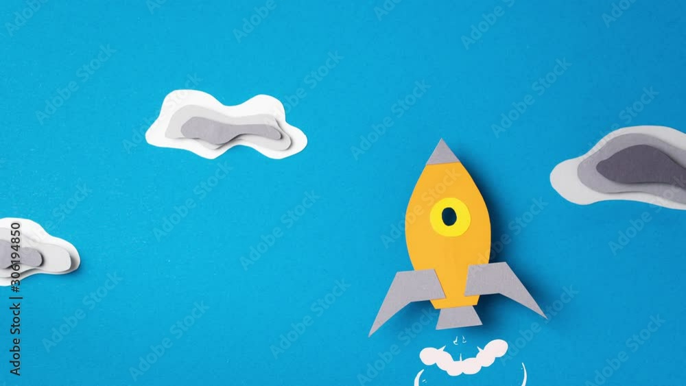 Lightning strikes rocket flying through clouds, stop motion animation. Paper art. Business start up concept. Сoncept of overcoming obstacles.