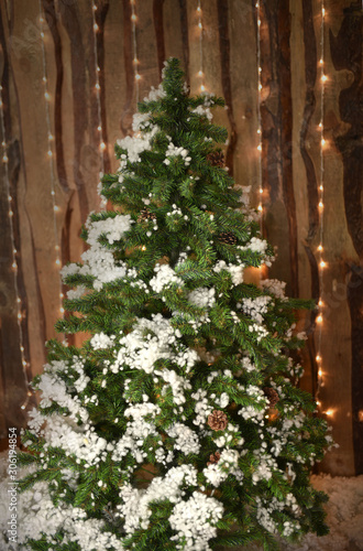 Decorative artificial christmas trees in the store