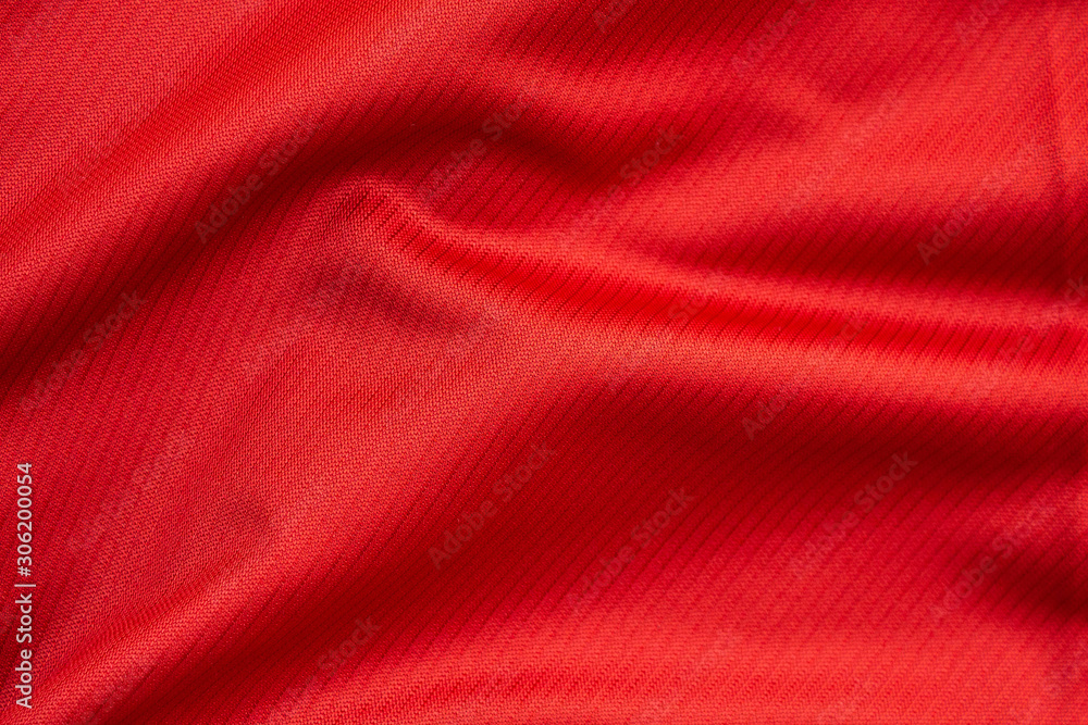 Fototapeta Red sports clothing fabric football jersey texture close up