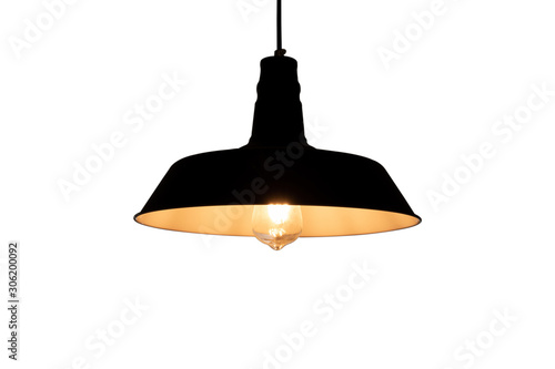 Black hanging lamp with warm light isolated with white background.