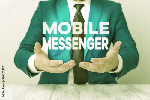 Wallpaper Mural Conceptual hand writing showing Mobile Messenger. Concept meaning mobile tool that allows users to send chat messages Man holds empty paper with copy space in front of him Space Torontodigital.ca