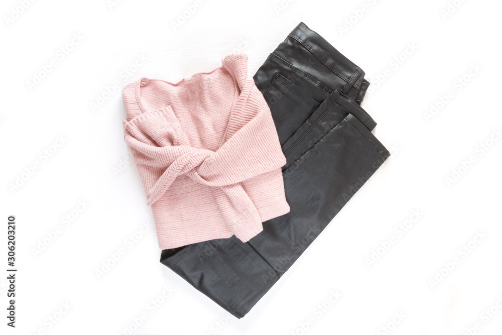 Set of clothes on a white background flat lay, recycling fast fashion, shopping, outfit Set of clothes on a white background flat lay, recycling fast fashion, shopping, outfit