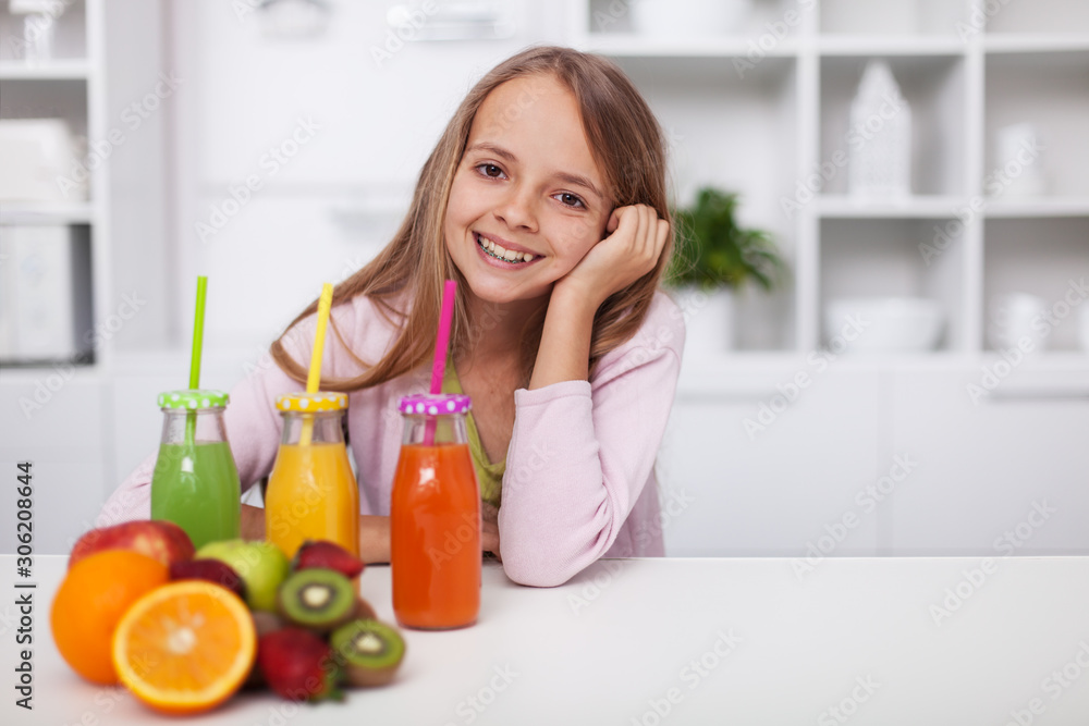 Happy teenage girl with a variety of healthy fresh fruit juices Happy teenage girl with a variety of healthy fresh fruit juices
