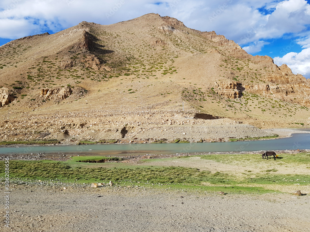 Travel photography from Lhasa, Tibet to Nepal. Beautiful views of high altitude landscapes, snow peaks and mountain ranges.