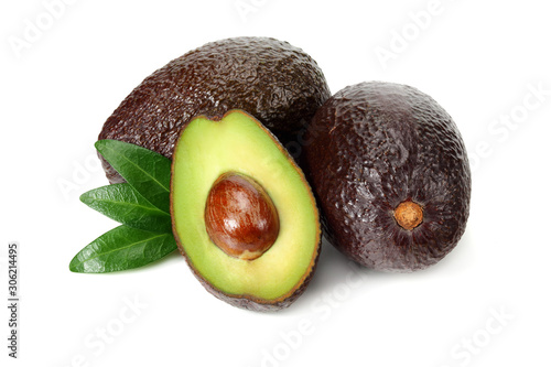 sliced brown avocado isolated on white background. Healthy food.