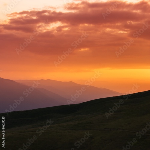 fabulous european summer dawn image  magic sunrise scenery  green hill on background amazing sky  colorful summer morning landscape in the mountains  Carpathians  Europe