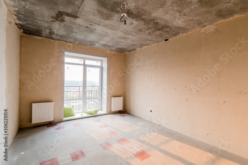Russia  Moscow- July 21  2019  interior room apartment. rough repair for self-finishing. interior decoration  bare walls of the room  stage of construction