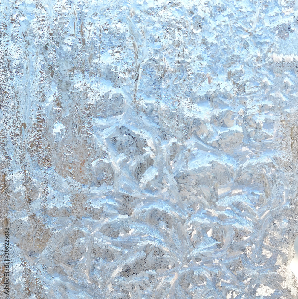 Frost on the window glass, frosty drawing.