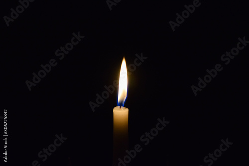 candle in the dark background