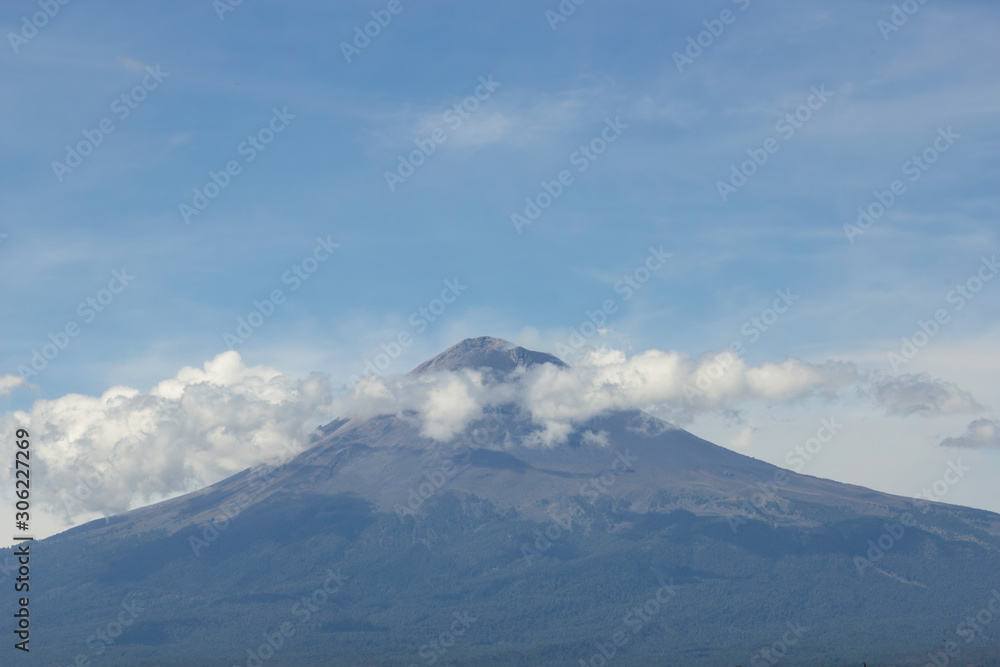 Popocatepetl active volcano, blue sky