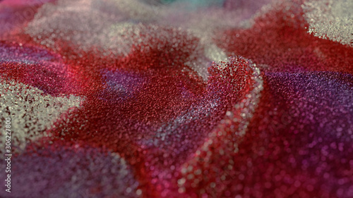 Colored Glitter particles with defocused blur background