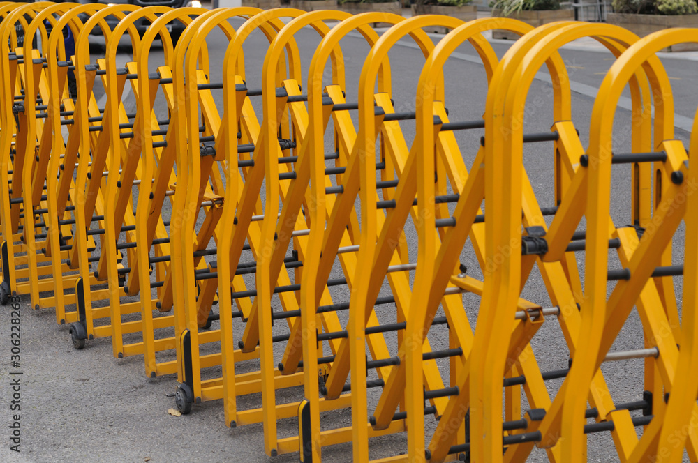 flexible temporary fencing of yellow painted metal flexible temporary fencing of yellow painted metal