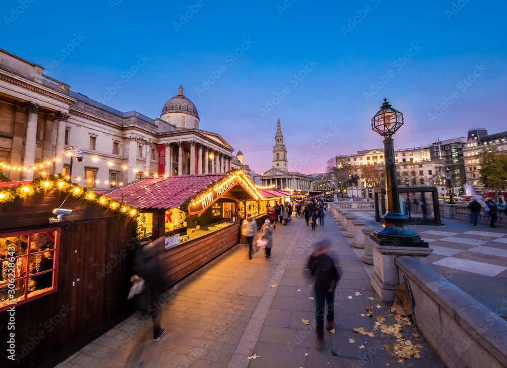 London, England, Uk - Christmas scene outdoors in Trafalgar square Market at blue hour in winter season