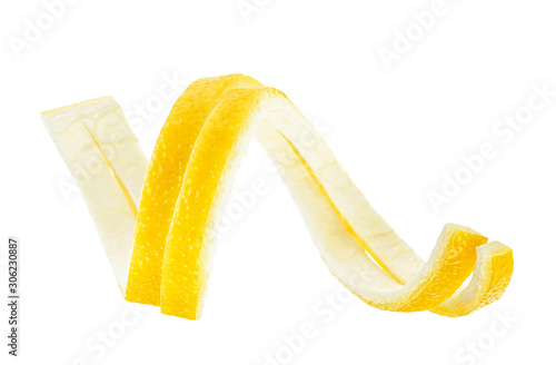 Lemon peel on a white background, close-up. Lemon twist.