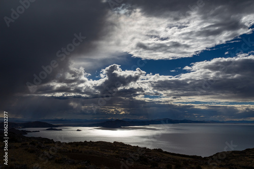 Sunset on Lake Titicaca. View from the Pachatata peak. Peru