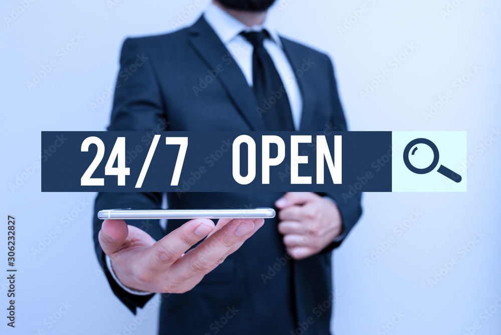 Handwriting text 24 Or 7 Open. Conceptual photo used to describe a service that is always available to serve Male human wear formal work suit hold smart hi tech smartphone use one hand Handwriting text 24 Or 7 Open. Conceptual photo used to describe a service that is always available to serve Male human wear formal work suit hold smart hi tech smartphone use one hand