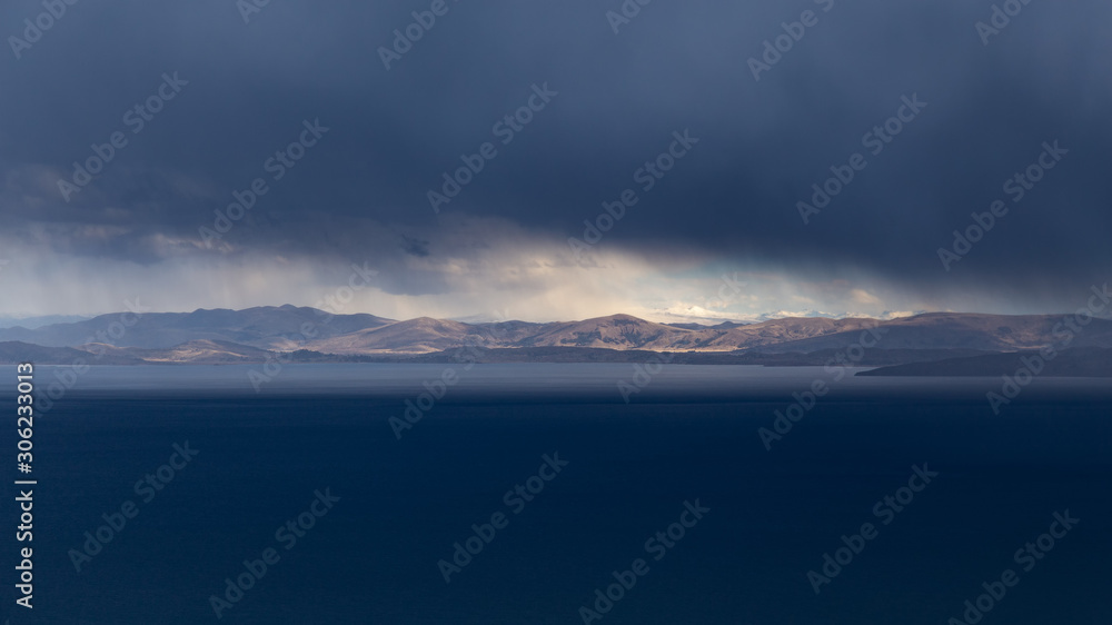 Sunset on Lake Titicaca. View from the Pachatata peak. Peru