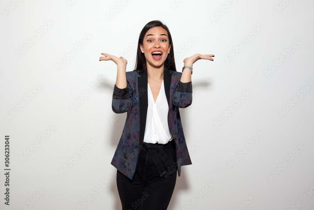 beautiful woman surprised and posing with her hands on white background beautiful woman surprised and posing with her hands on white background