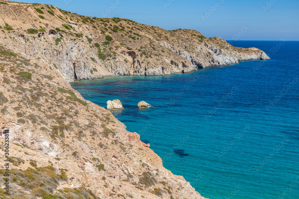 Obraz premium Cliffs, rocks and sand in Firopotamos beach