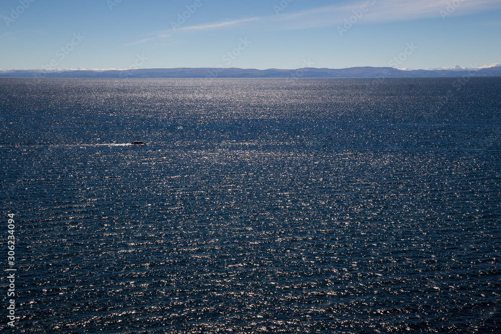 Sunset on Lake Titicaca. View from the Pachatata peak. Peru