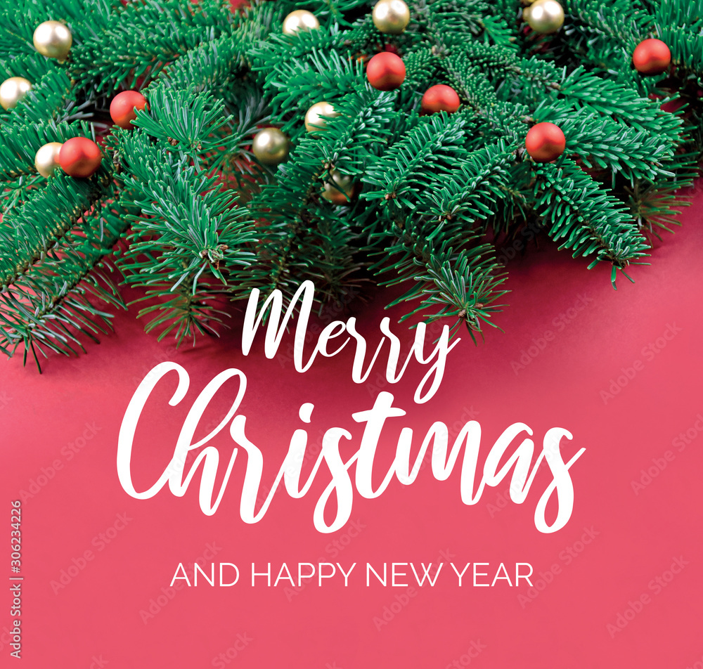 Merry Christmas and Happy New Year Sign with spruce branch. Christmas red background with ornate spruce branch stock images. Elegant holiday background. Red Christmas greeting card Merry Christmas and Happy New Year Sign with spruce branch. Christmas red background with ornate spruce branch stock images. Elegant holiday background. Red Christmas greeting card