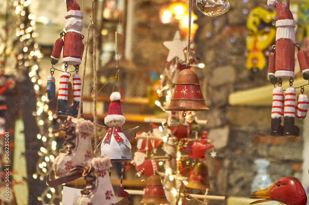 Vintage Christmas toys. Atmospheric Christmas photography, wooden Christmas toys hanging on a rope.