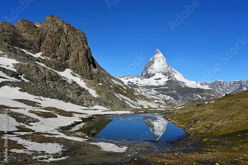 Riffelsee lake reflection of Matterhorn, Zermatt Switzerland