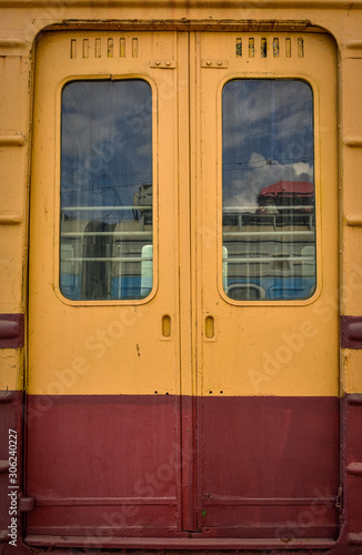 metal doors on the train, orange train doors