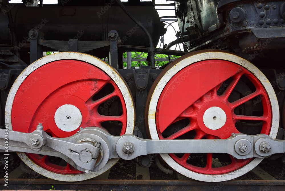 red metal wheels, two wheels of steam locomotive