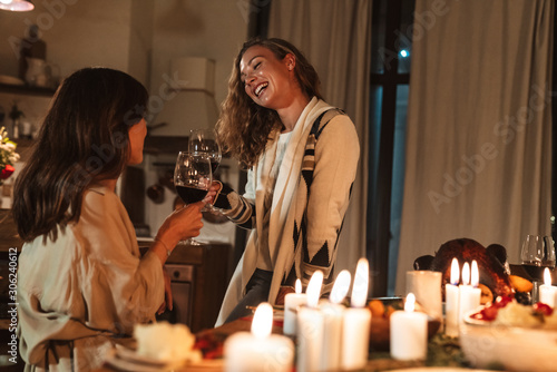 Photo of nice cheerful women having Christmas dinner