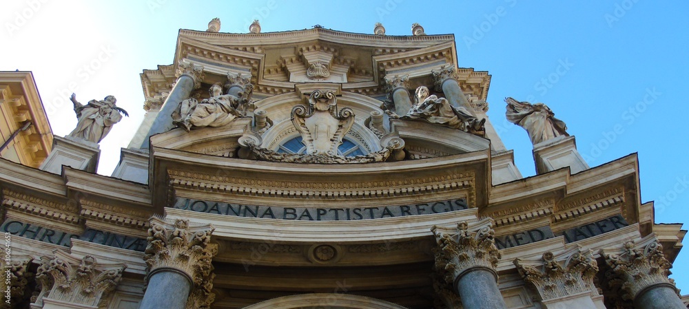Torino, Italy - 11/28/2019: An amazing photography of the old buildings of Turin. Detailed caption of the external structures from the Renaissance period. Torino, Italy - 11/28/2019: An amazing photography of the old buildings of Turin. Detailed caption of the external structures from the Renaissance period.