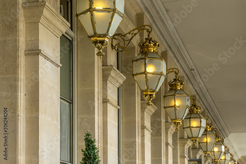 Gold-plated and decorated chandeliers in Paris, France. 