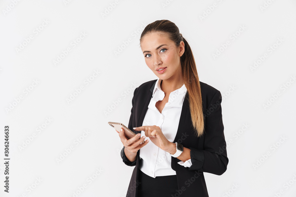 Photo of attractive businesswoman typing on cellphone Photo of attractive businesswoman typing on cellphone