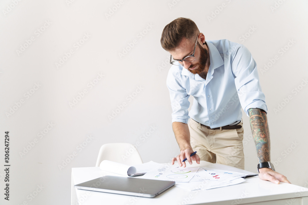 Businessman isolated work with documents.