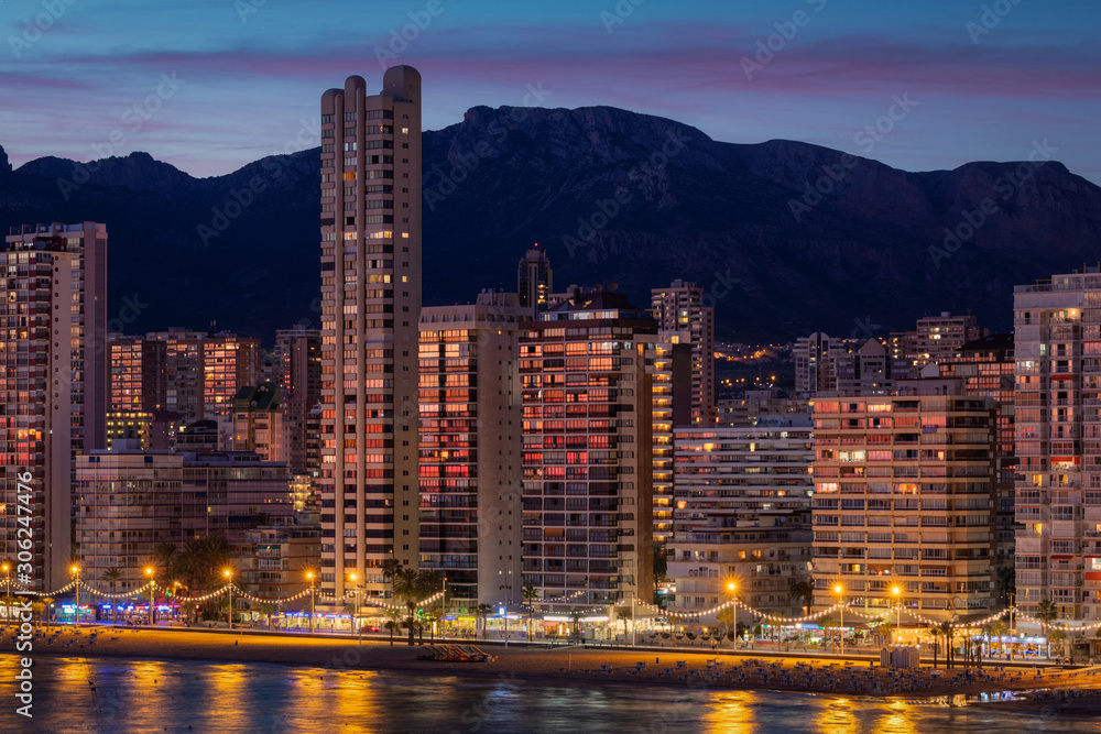 Naklejka premium Modern city of Benidorm at evening lights, Alicante Mediterranean of Spain